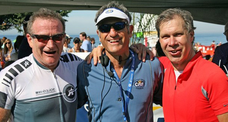 Robin Williams shares a laugh with CAF co-founder Bob Babbitt and fellow teammates at the San Diego Triathlon Challenge.
