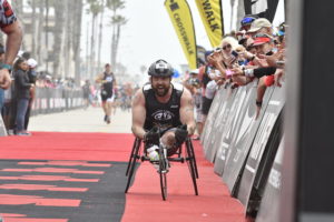 Evan Morgan finishing the IRONMAN 70.3