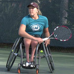 lady playing wheelchair tennis