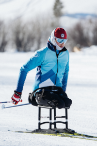 Lera Doederlein on sit ski in the snow