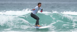 Liv Stone surfing