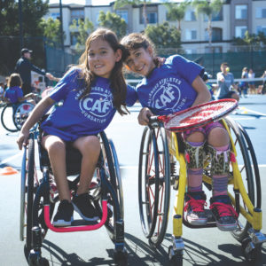 Wheelchair Tennis GIrls copy adobe stock photo