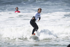 LIv Stone Surfing at IRONMAN + CAF Surf cliinic
