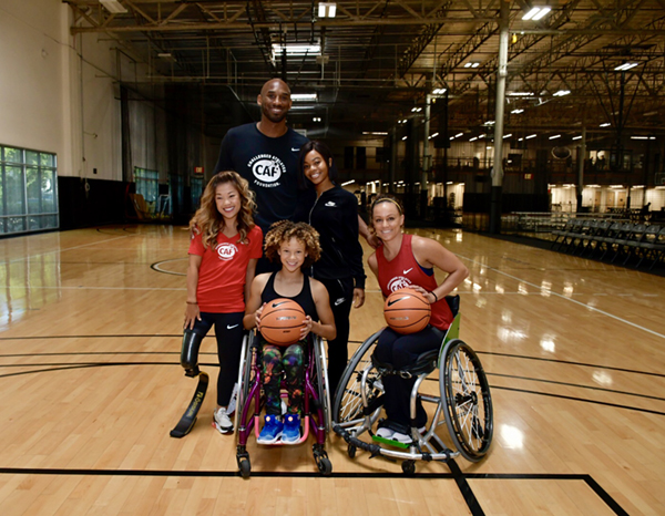 Kobe Bryant with CAF athletes Megan Blunk, Scout Bassett, and Luzy 