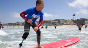 William surfing at CAF youth adaptive surf camp