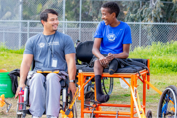 Justin coaching adaptive shot-putter