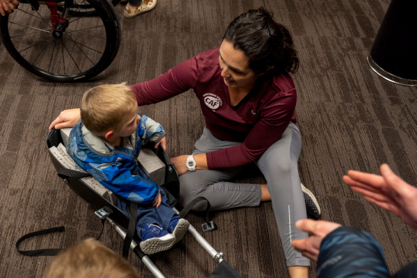 CAF Idaho Regional Director Jennifer Skeesick with little boy