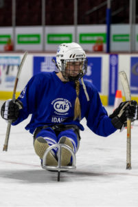 Heidi Pearson playing Sled Hockey