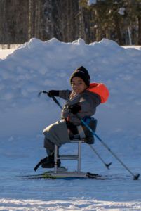 Jaxon Palmer wheelchair skiing in Idaho