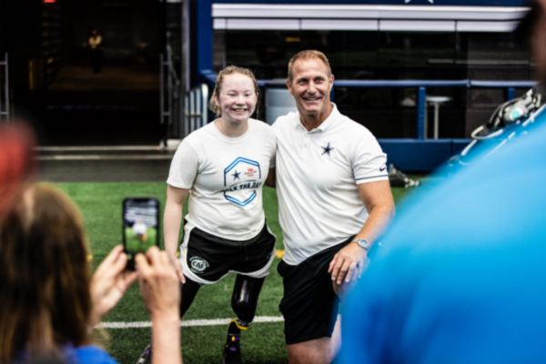 The Challenged Athletes Foundation logo appears beside the Smoothie King logo, representing their partnership to support athletes with physical disabilities.