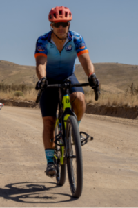 Anthony Skeesick riding a bike in Idaho