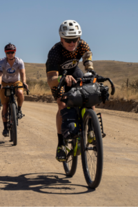 Willie Stewart riding a bike in Idaho