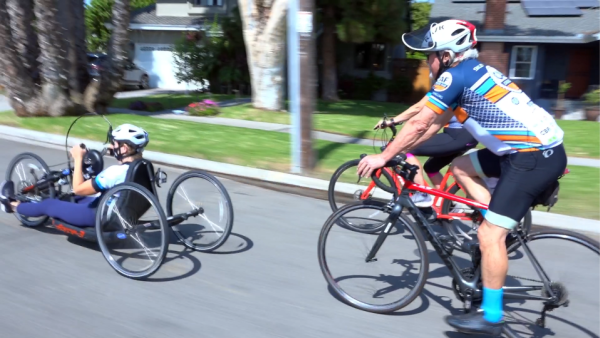 Larry Anna and Amy riding on bikes