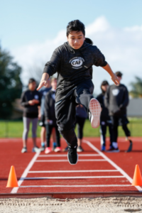 Nefi Rodarte participating in long jump