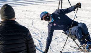 Wilson Dippo on sit ski demonstrating technique