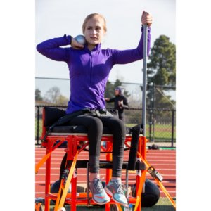 athlete doing a seated throw for shotput