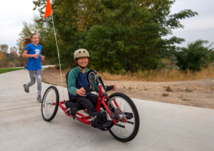 CAF Idaho adaptive youth athletes riding Zipper Handcycles