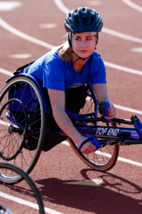 Abby Dunn in wheelchair racing chair at NorCal 2020 HS Adaptive Track + Field Training