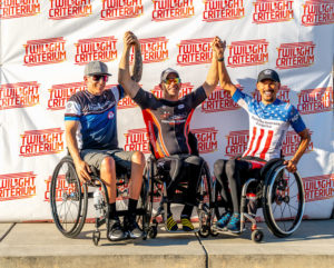 CAF Para Cyclists posing for photos in wheelchairs at 2019 Boise Twilight Criterium