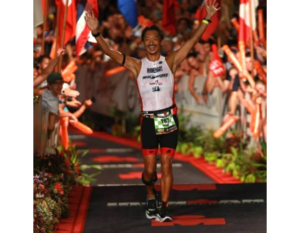 CAF Athlete Kevin Rhinehart at Ironman finish line