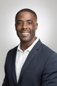 Headshot of Chad Merriweather in suit