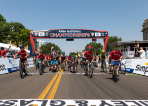 KIds on bicycles and handcycles at start line of Kids Ride