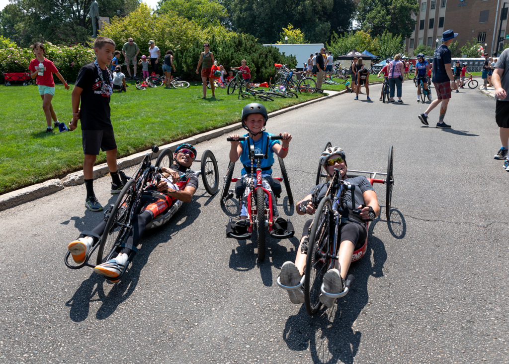 Group of kids on handcycles