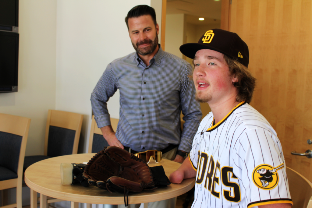 Landis-Sims-sitting-with-Padres-Chief-Executive-Officer-Erik-Greupner