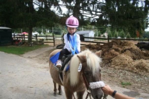 Young Sarah Oldenski on pony