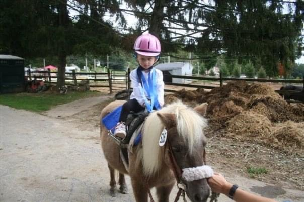 Young Sara Oldenski on pony