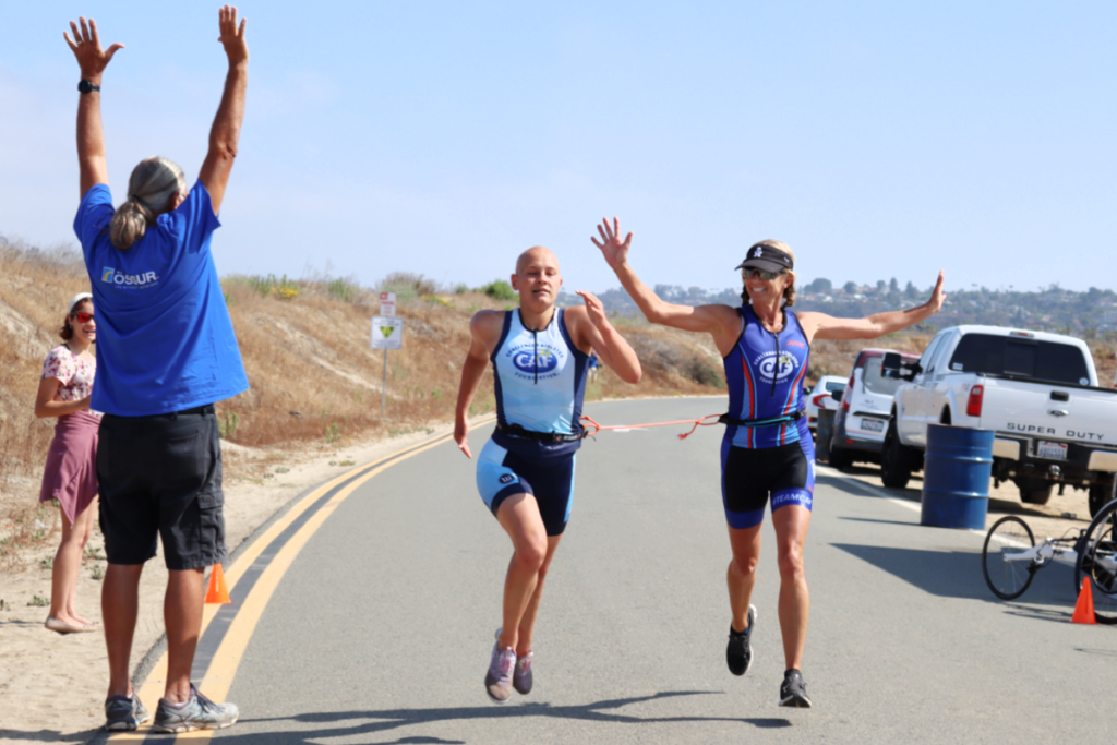 Maggie and Christy at Finish Line at 2021 CAF Tri Camp