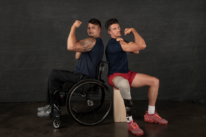 Roomates Justin Phongsavanh and Trenten Merrill showing their biceps at 2021 Paralympic Photoshoot