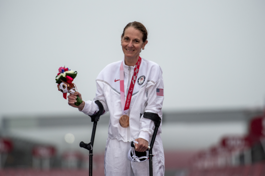 Jill Walsh at 2020 Paralympic Games with Bronze Medal on Podium