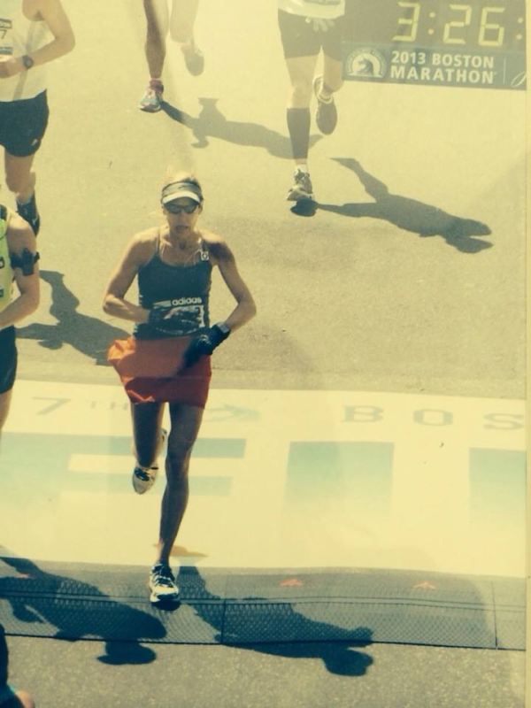 Michelle Pinard running in 2013 Boston Marathon at finish line