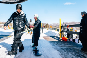 Shaun White and Zach Sherman getting off ski lift