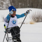 Little boy adaptive skiing