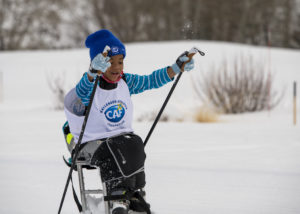 Little boy adaptive skiing