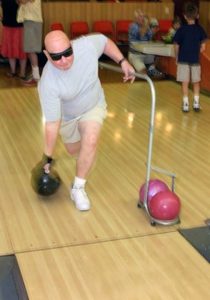 guide rail for bowling. [Photograph]. https://wcblind.org/2019/11/blind-bowling-an-indoor-sport-that-is-fun-for-everyone/