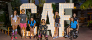 Children at CCC Weekend standing in front of large CAF letters