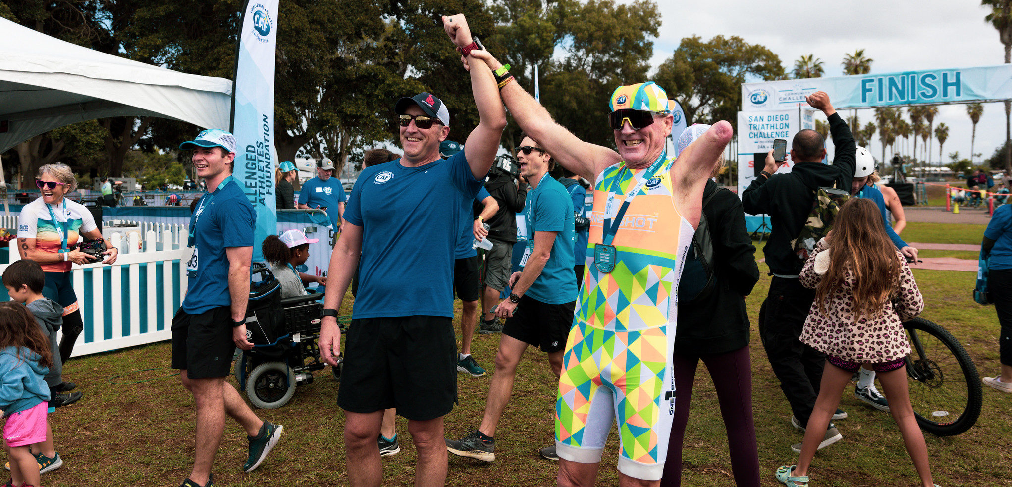 SDTC athlete run across finish line