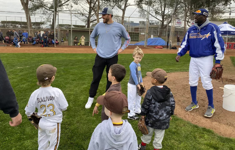 Padres pitcher Joe Musgrove (center) talks to participants in a Jan. 14 event presented by La Jolla Youth Baseball and the Challenged Athletes Foundation.