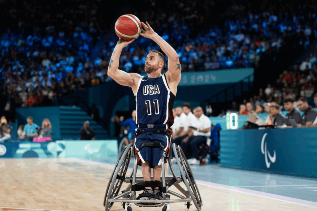 Steve Serio on a basketball court shooting a basketball in a team USA jersey 
