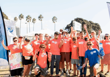 Image of volunteers cheering at the san diego traithlon challenge in San Diego, ca
