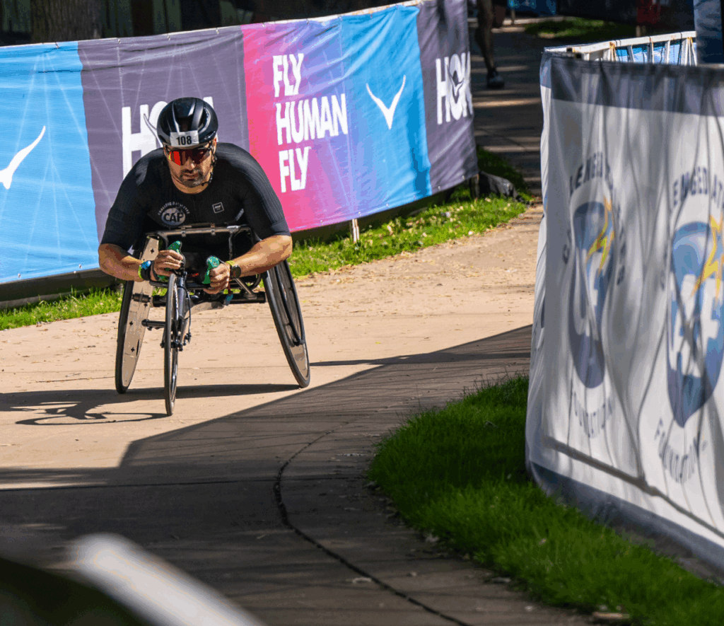 Josh Sweeney in handcycle participating in Boise Ironman 70.3