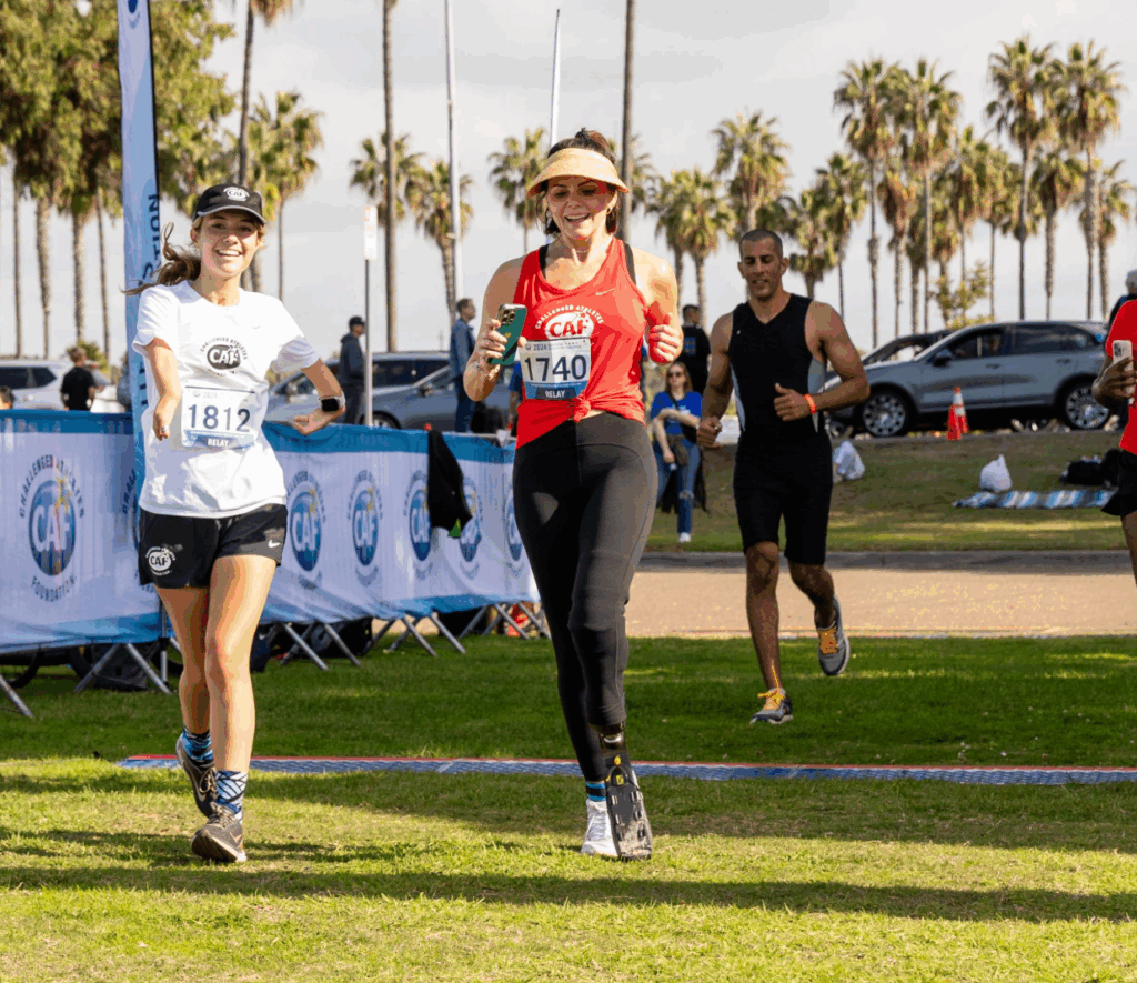 Liv Stone and Tara Butcher crossing the finish line at SDTC