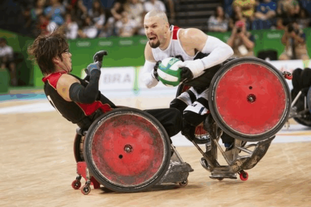 Two wheelchair rugby athletes collide as one player drives forward with the ball