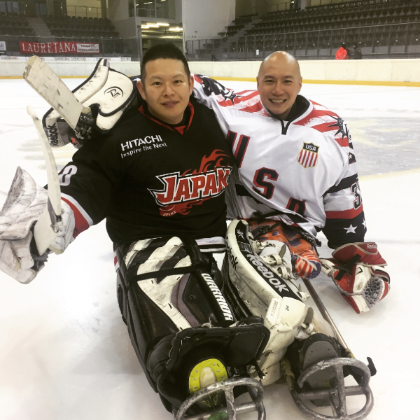 Jen Lee, Sled Hockey player for TEAM USA with a player from Japan