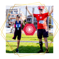 CAF athlete crossing the finish line at the San Diego Triathlon Challenge fueled by Toyota