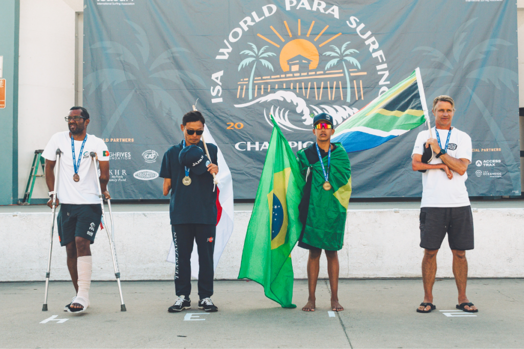 Ant Smyth representing South Africa on the podium at the ISA World Para Surfing Championship.