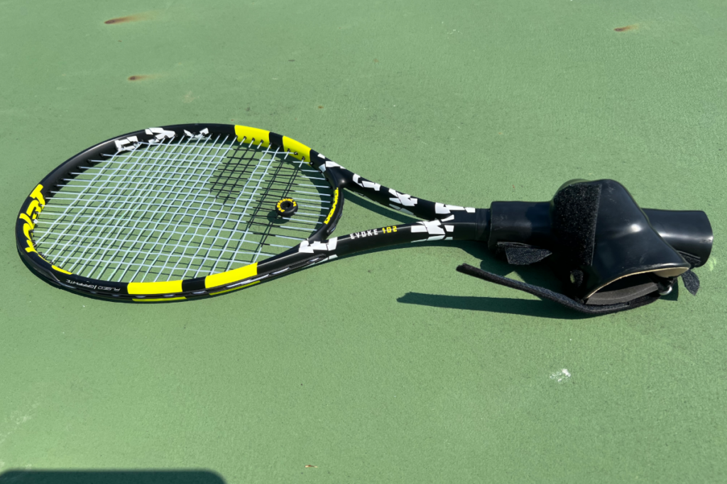 Tennis racket with an adapted grip designed to help Jeff Belcher hold and control the racket.